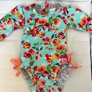 Rufflebutts rashguard swimsuit